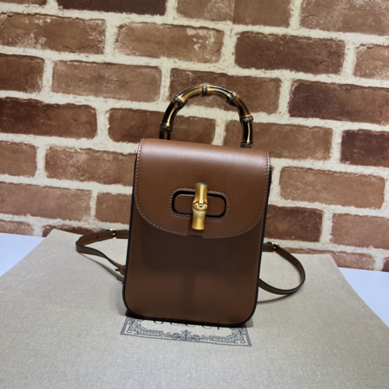 G*u*i top handle bags
